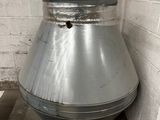 a large metal object in the corner of a room