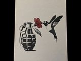 tableau représentant un colibri et une grenade contenant une fleur