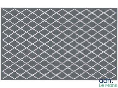 a gray and white rug with a diamond pattern on it