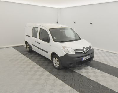 a white van that is parked in a room