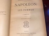 opened book on a wooden table with a glass of wine