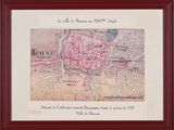 une vieille carte de la ville de Paris dans un cadre en bois