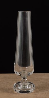 a glass that is sitting on a table