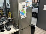 a refrigerator that has a lot of things on it