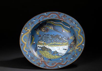 a blue plate with a picture of a bird on it