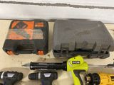 a lot of tools that are laying out on the floor