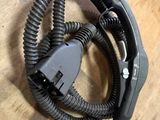 an image of a cord connected to a charger on a table