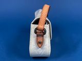 a close up of a white purse with a brown strap