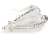 a glass sculpture of a sea shell on a white surface