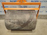 a close up of a roll of concrete sitting on top of a pallet