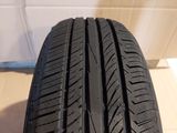 a close up of a tire on a tile floor in a room