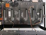 a close up of a computer motherboard with many wires