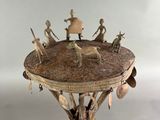 a small table with a lot of figurines on it