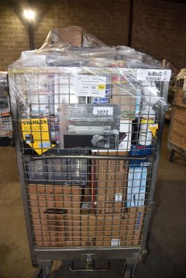 a shopping cart with many items in it in a warehouse