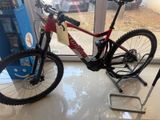 a bike that is parked in front of a vending machine