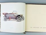 an open book with a drawing of an old car on it