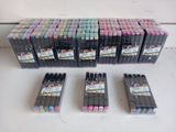a lot of pens that are sitting on a table