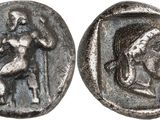 a silver coin with an image of a man on it