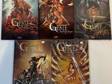 un lot de quatre livres posés sur une table, sur fond blanc