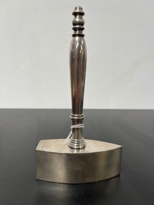 a close up of a metal object on a table