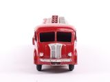 a red fire truck that is sitting on a white surface