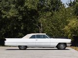 a white car that is parked in a parking lot
