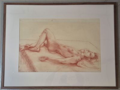 painting of a nude female reclining on a bed in a frame