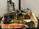 a wooden box with a lot of old items on it