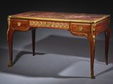 an image of a small table with a marble top and drawers