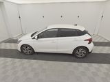 a picture of a white car parked in a garage