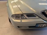 a picture of a car parked in a garage