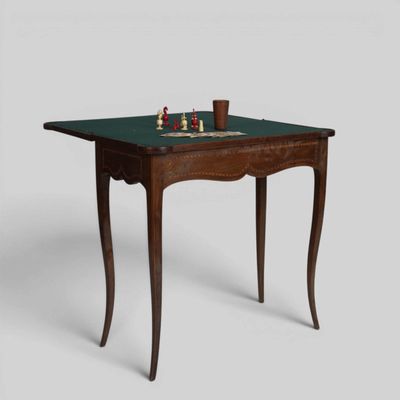an image of a small table with a chess board on top of it
