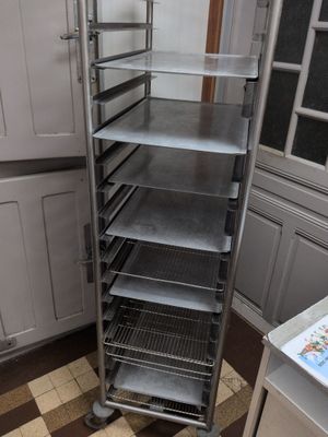 an image of a kitchen with a rack of food in it