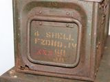 an old metal box that has a label on it