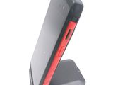 a cell phone that is sitting on top of a stand