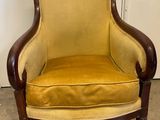 an image of a chair with a yellow upholstered seat
