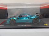 the model of a blue sports car is in a display case