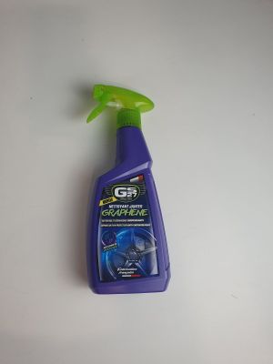 a close up of a bottle of cleaner on a table