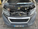 a car with its hood open with the hood up