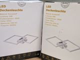 two boxes of led deckenleuchte on the table