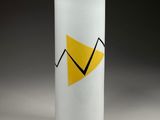 a close up of a white cup with a yellow arrow on it