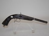 an old gun on display on a clear acrylic stand