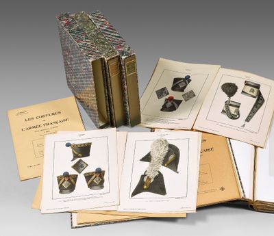 several books with pictures of hats and hats on them sitting on top of each other