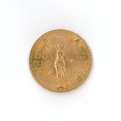 une pièce d'or avec l'image d'une femme dessus