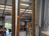 a large mirror in the middle of a room