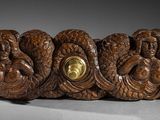 an image of a close up of a carved object on a table