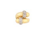 a pair of gold rings with diamonds on a white background