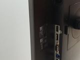 an image of a flat screen tv with a remote on it