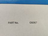 a close up of a piece of paper with the words part no g6067