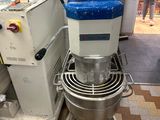 an image of a kitchen with a mixer and other appliances